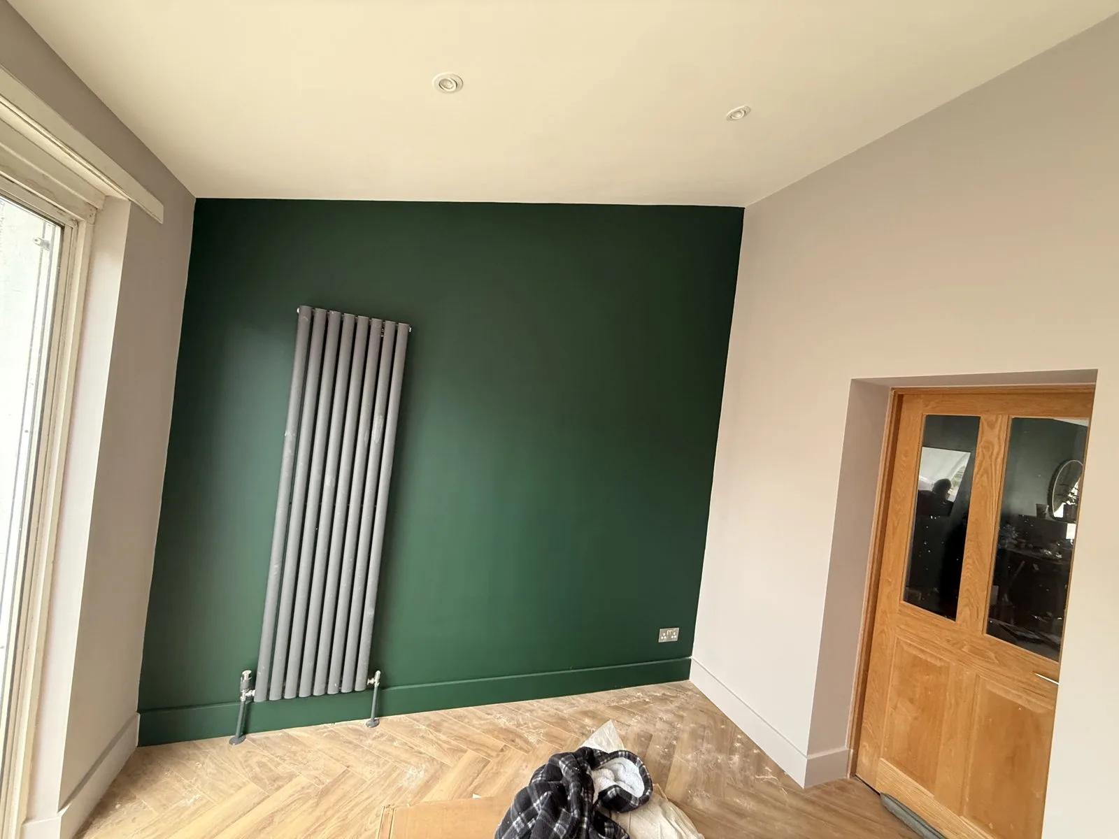 Deep green feature wall — painting and decorating by LJAY’s