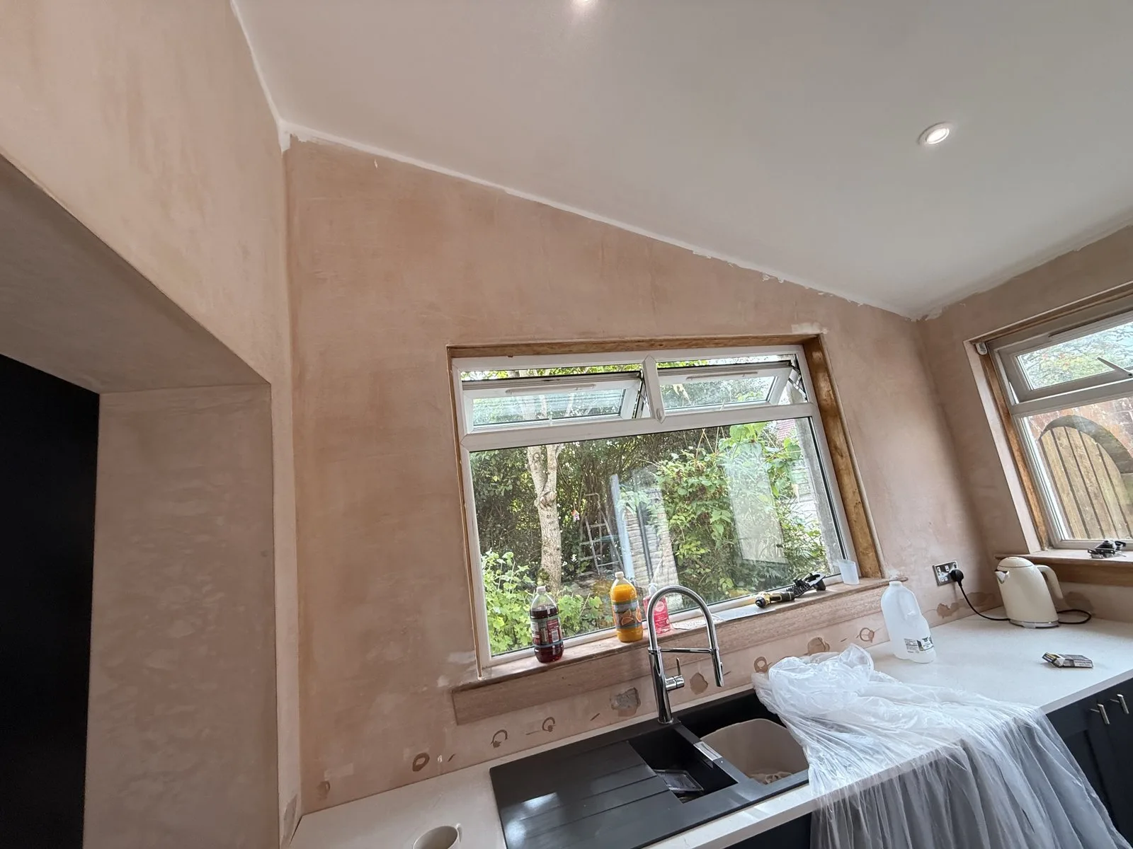 Before: freshly plastered kitchen wall — painting and decorating by LJAY’s